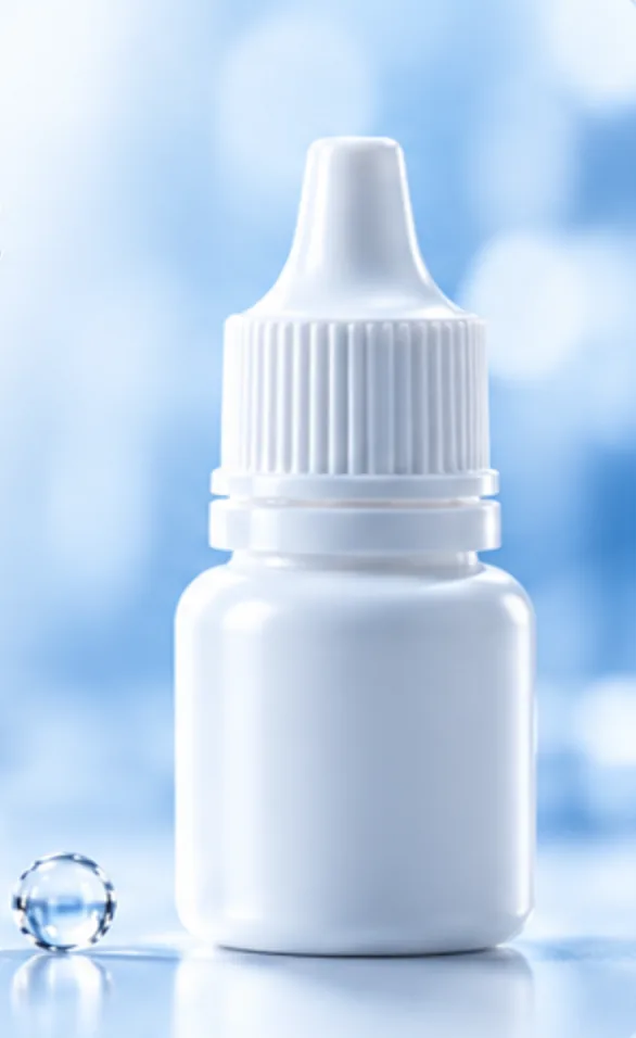 White ophthalmic dropper bottle with a droplet